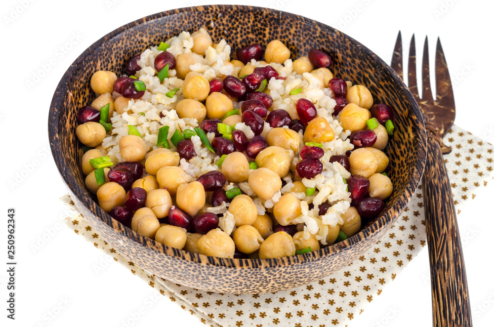 Vegetarian dish with chickpeas, rice, pomegranate. Vegetarian dish with chickpeas, rice, pomegranate.