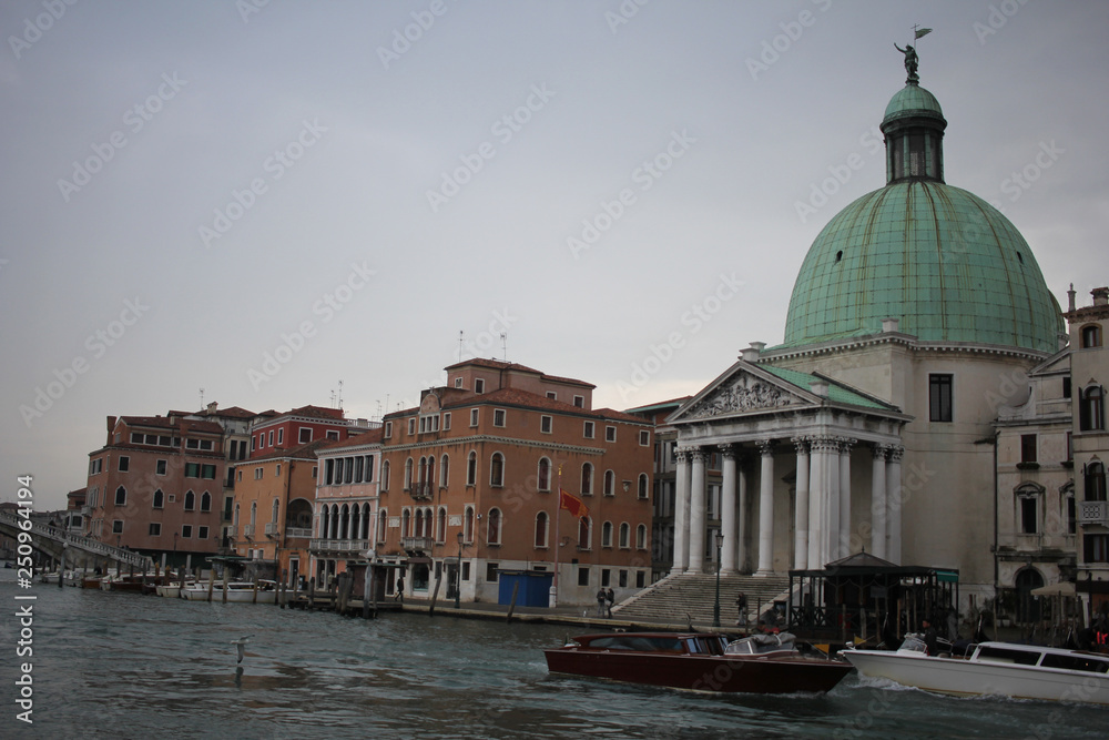 Water taxi Sailing travel, Grand Canal Venice, Italy surrounding by Ancient attractive building church, Commercial advertisement ticket for day trip boat Ferry terminal in Europe