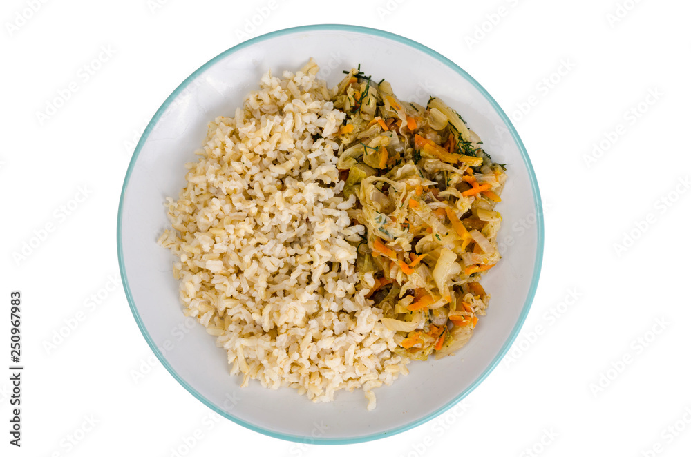 Vegetarian healthy food. Braised cabbage with carrots, brown rice. Vegetarian healthy food. Braised cabbage with carrots, brown rice.