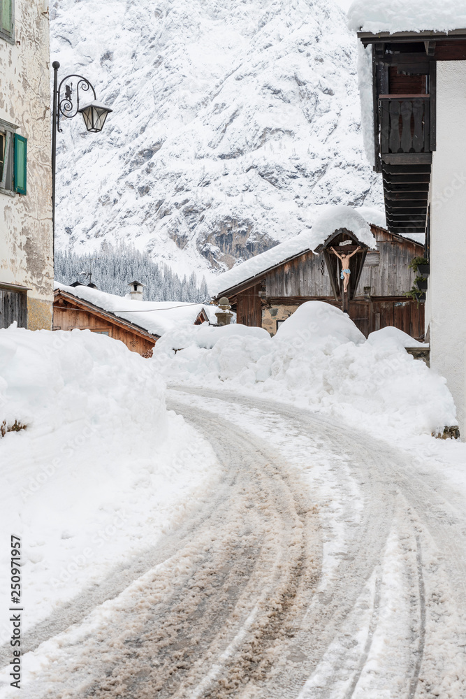 Snow magic. Walk in the ancient village of Sappada. Friuli
