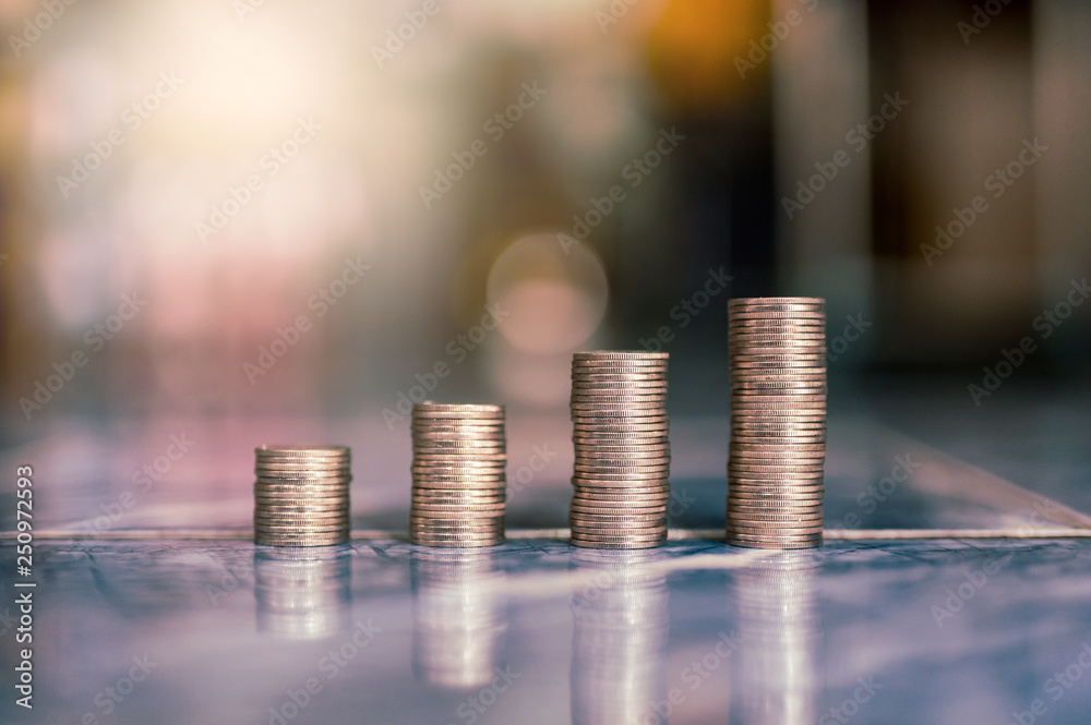 step of coins stacks, money, saving and investment or family planning concept. step of coins stacks, money, saving and investment or family planning concept.