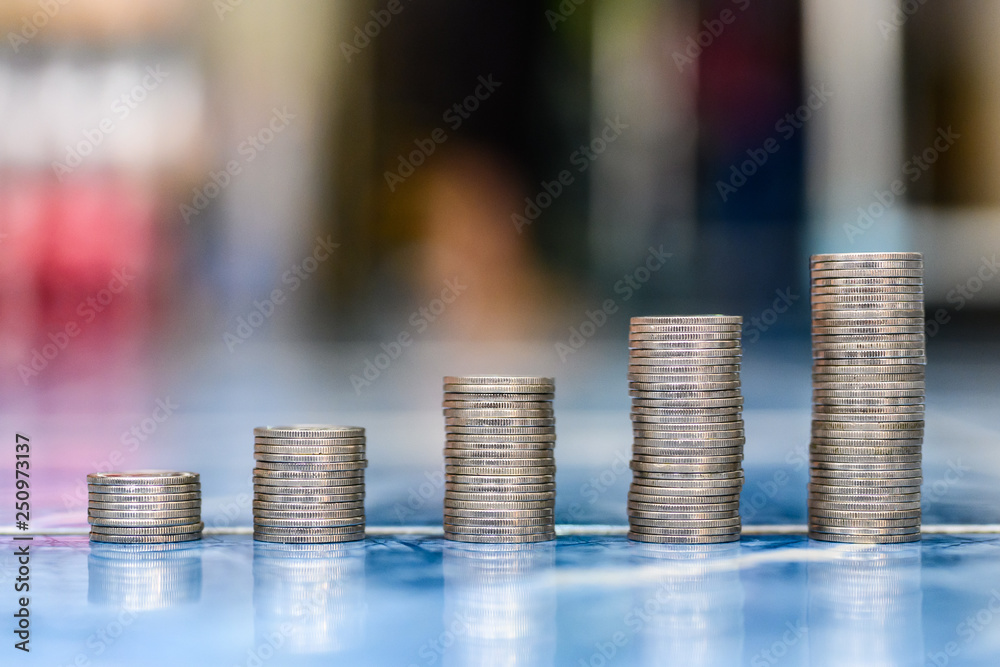 step of coins stacks, money, saving and investment or family planning concept. step of coins stacks, money, saving and investment or family planning concept.