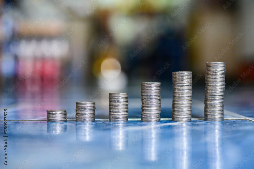 step of coins stacks, money, saving and investment or family planning concept. step of coins stacks, money, saving and investment or family planning concept.