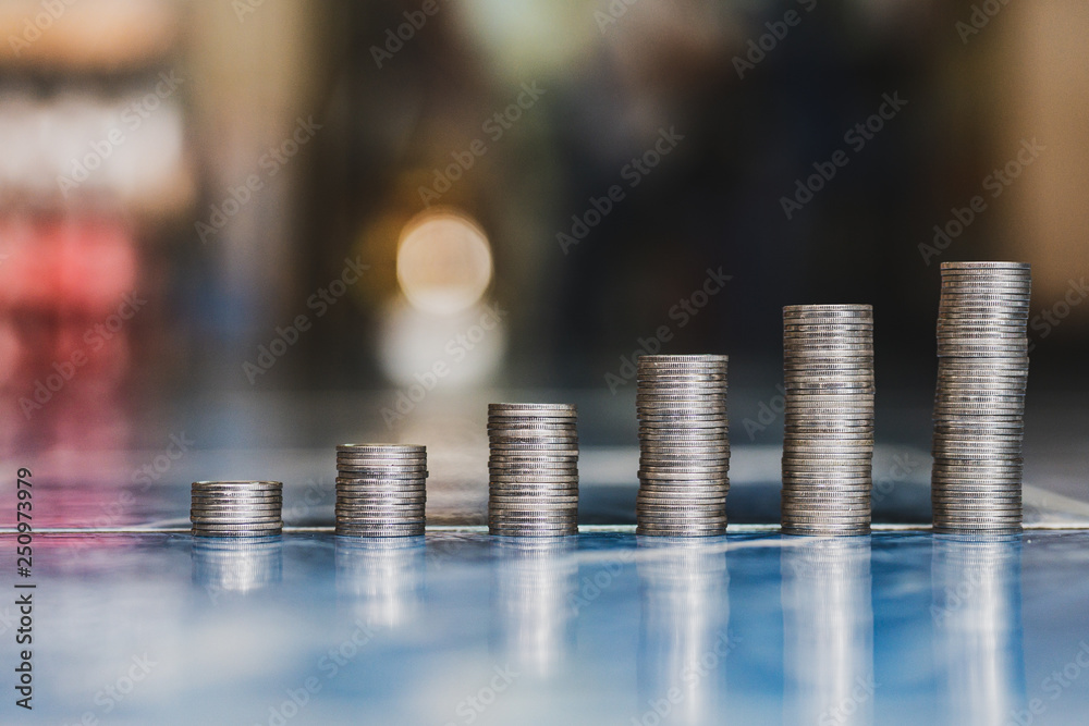 step of coins stacks, money, saving and investment or family planning concept. step of coins stacks, money, saving and investment or family planning concept.
