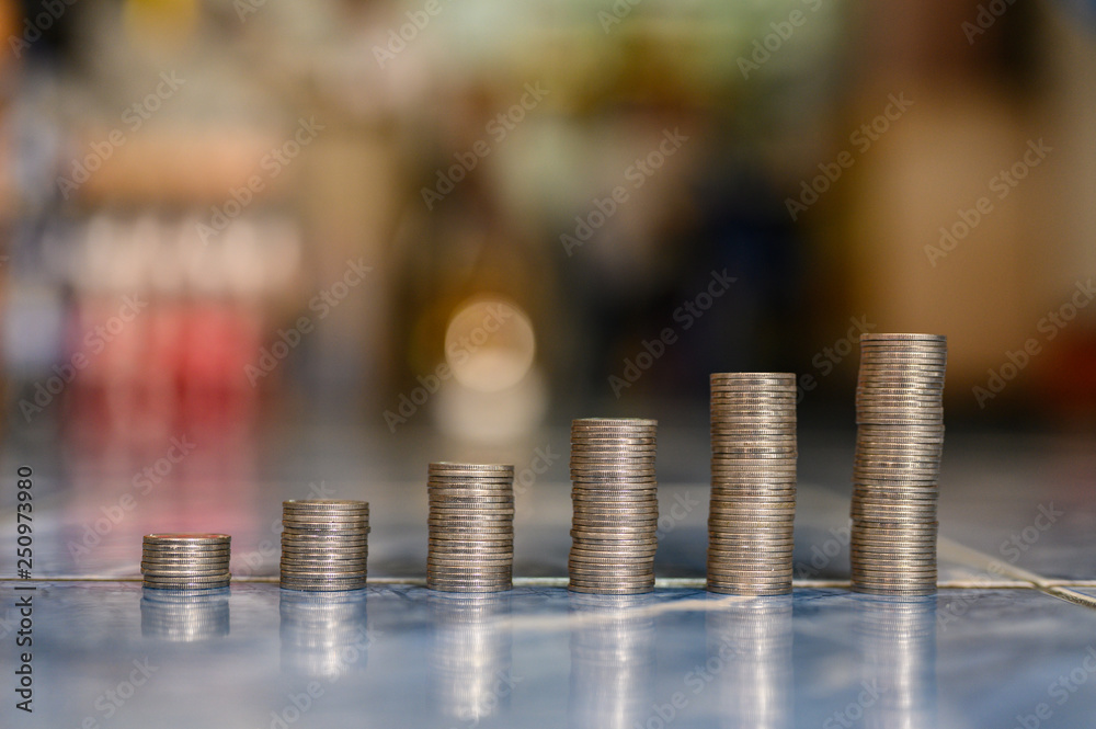 step of coins stacks, money, saving and investment or family planning concept. step of coins stacks, money, saving and investment or family planning concept.