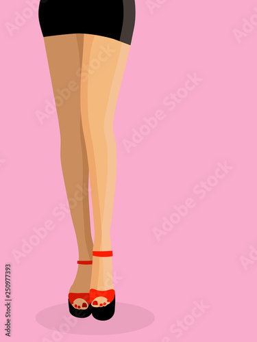 Girl's legs on pink background