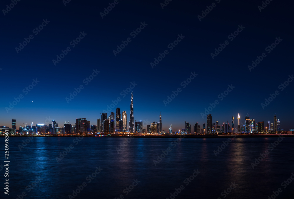 Panoramic view of Dubai cityscape at night
