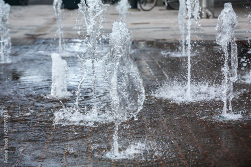 Short exposure photo of a few small fountains in Kouvola  Finland on a summer day.