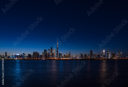 Panoramic view of Dubai cityscape at night
