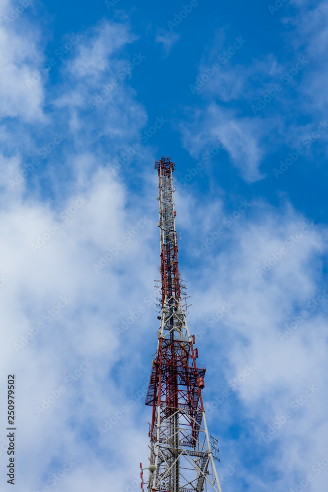 Antenna tower with blue sky and cloud background. Antenna tower with blue sky and cloud background.