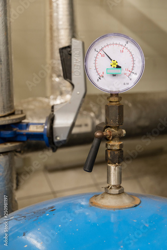 Pressure gauge showing system pressure.