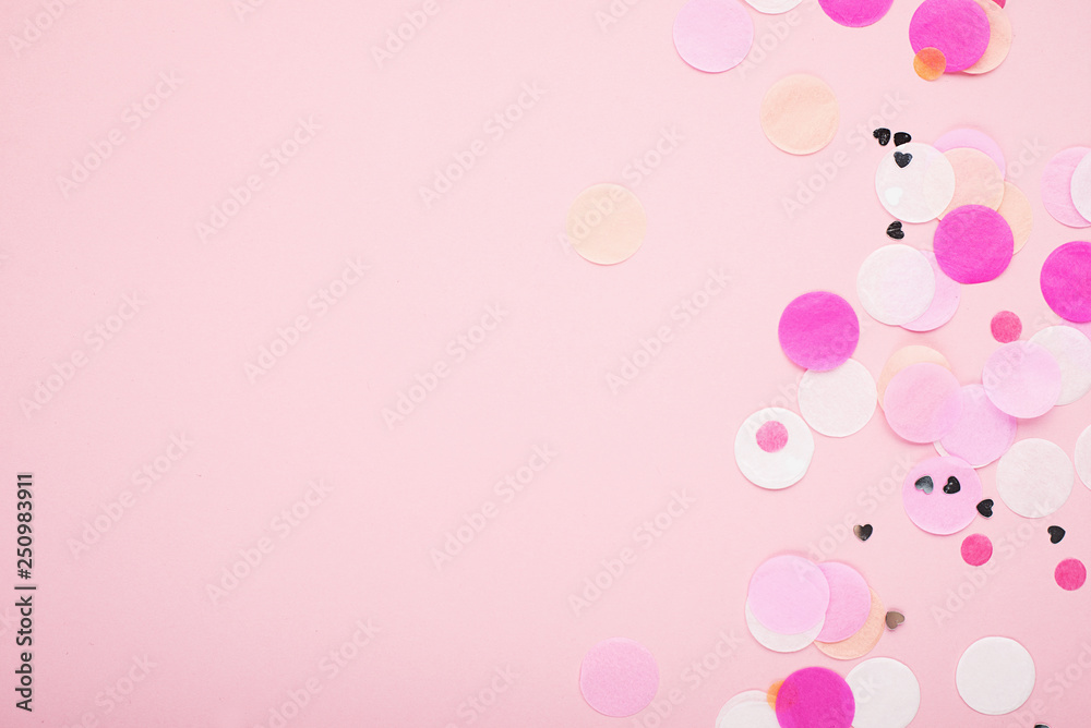 Pink festive universal background with silver confetti. Bright blank for the holiday project. Horizontal,