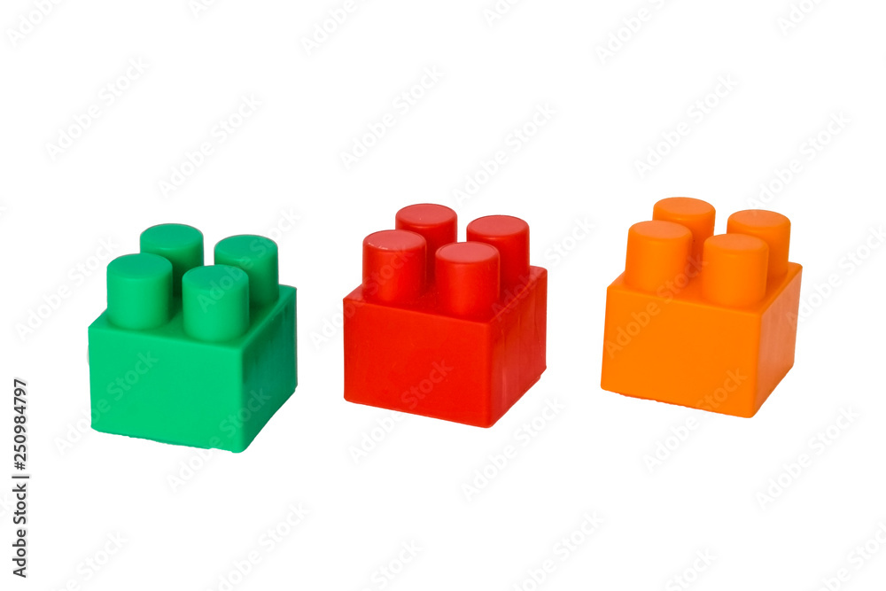 details of a children's plastic constructor on a white background. colored cubes. block. details of a children's plastic constructor on a white background. colored cubes. block.