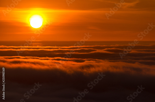  Dreamy misty landscape above the sea of clouds  mountains at sunset in Iceland