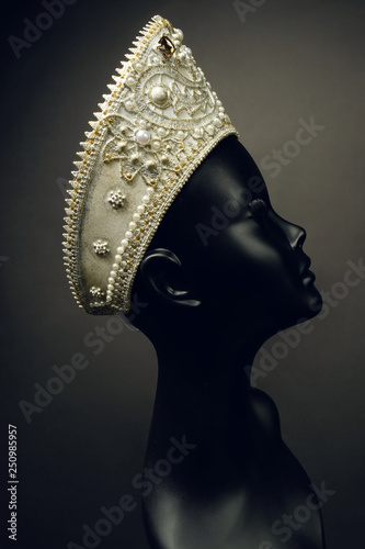 Mannequin head in creative Russian white kokoshnick with jewels and pearls