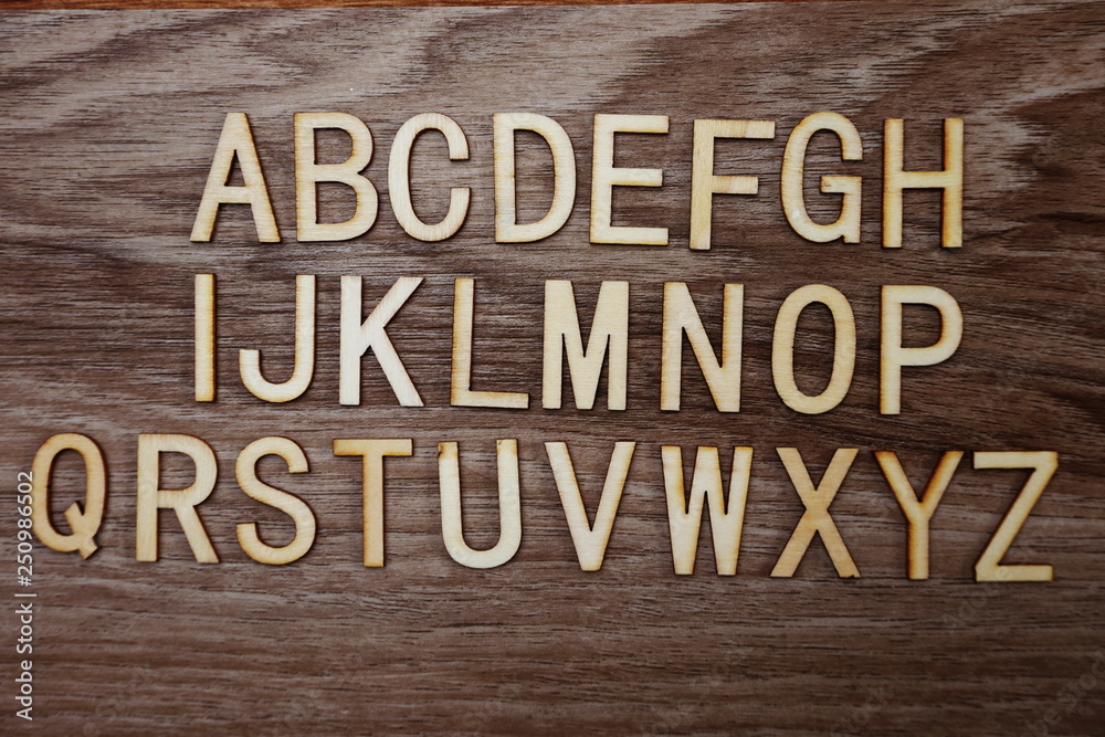 Fototapeta premium A-Z alphabet on wooden background