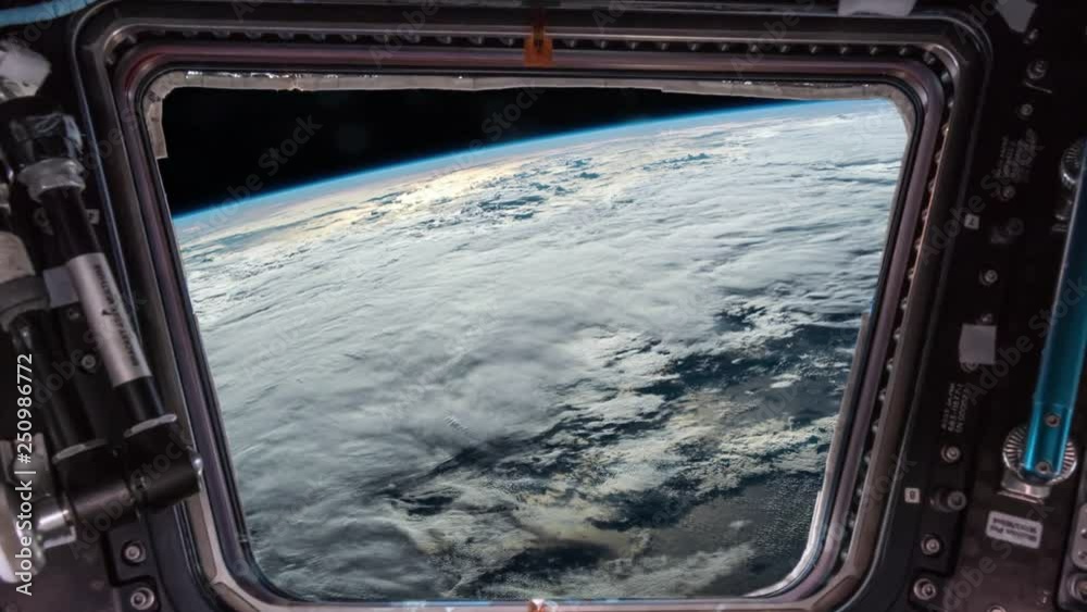 Earth as seen through window of International Space Station ISS . Elements of this image furnished by NASA. I Earth as seen through window of International Space Station ISS . Elements of this image furnished by NASA. I