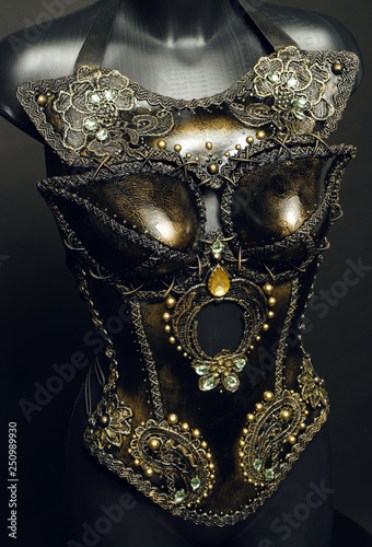 Gorgeous golden corset with precious stones