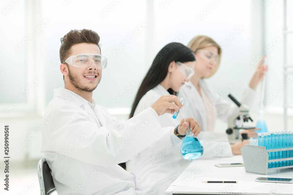 group of scientists conduct research in the laboratory group of scientists conduct research in the laboratory