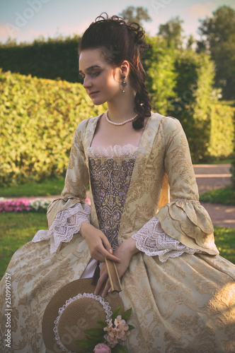 Ladie in XVIII century rococo dress