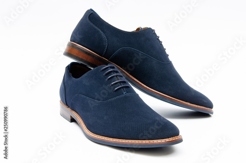 Cuadro en lienzo Blue suede shoes isolated on white background