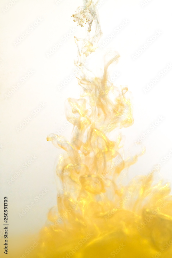 golden paint in water, explosion of paint under water ink. golden paint in water, explosion of paint under water ink.