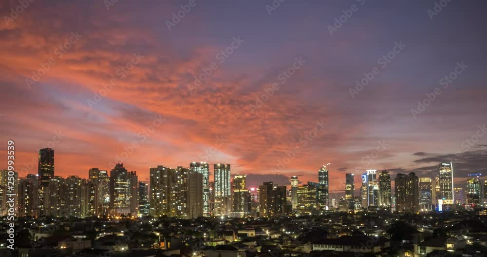 JAKARTA, Indonesia - February 21, 2019: Time lapse of beautiful aerial view of Jakarta downtown with skyscrapers background at dusk. Shot in 4k resolution JAKARTA, Indonesia - February 21, 2019: Time lapse of beautiful aerial view of Jakarta downtown with skyscrapers background at dusk. Shot in 4k resolution