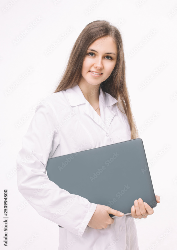 friendly female doctor with a laptop .isolated on a white friendly female doctor with a laptop .isolated on a white