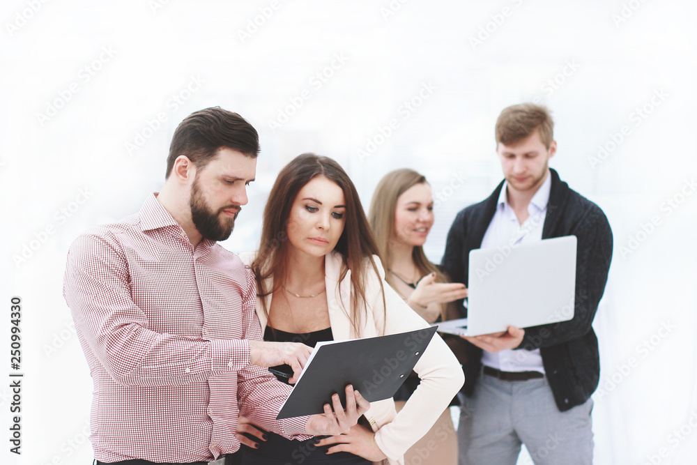 business team discusses the working documents before the business meeting business team discusses the working documents before the business meeting