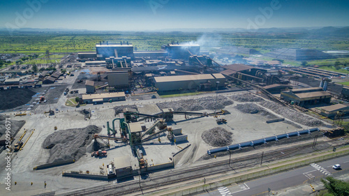 Ore processing, smelting and pelletizing plant seen from above on a sunny day