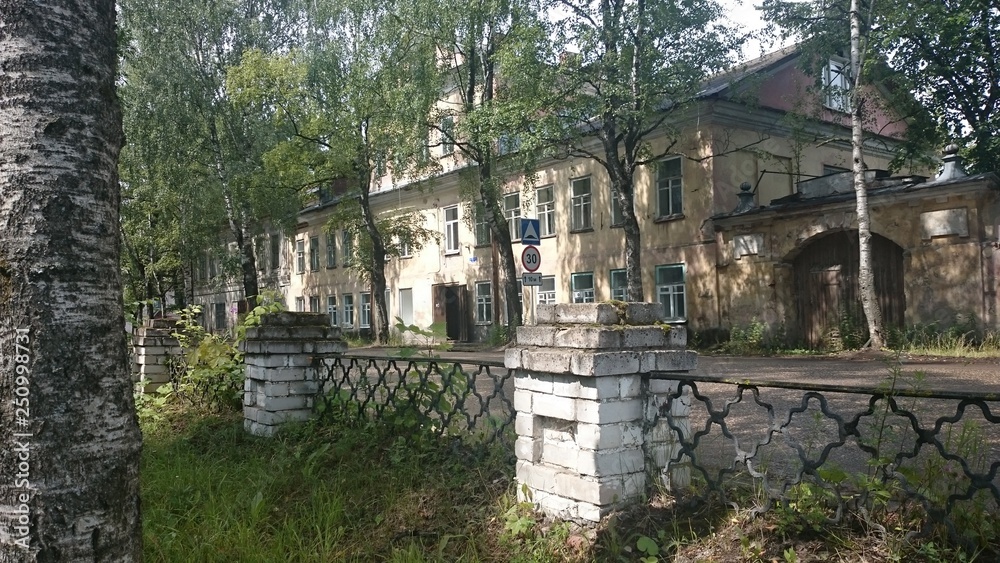 Abandoned brick and wooden houses in pishchita, located in Ostashkov, Tver region, Russia.