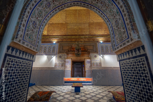 Arabic seamless pattern - traditional Islamic background. Decorative element. Traditional Moroccan pattern tiled ceiling in Dar Si Said Museum in Marrakech, Morocco.  photo