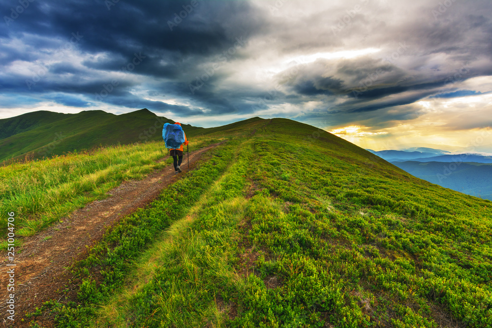 A wonderful summer vacation with fantastic landscapes in the Ukrainian Carpathians on the Borzhava ridge, with a dramatic storm and a traveling girl.