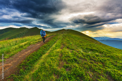 A wonderful summer vacation with fantastic landscapes in the Ukrainian Carpathians on the Borzhava ridge, with a dramatic storm and a traveling girl.