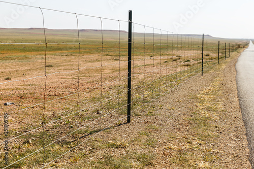 wire mesh fence, wire mesh along the highway, Inner Mongolia, China