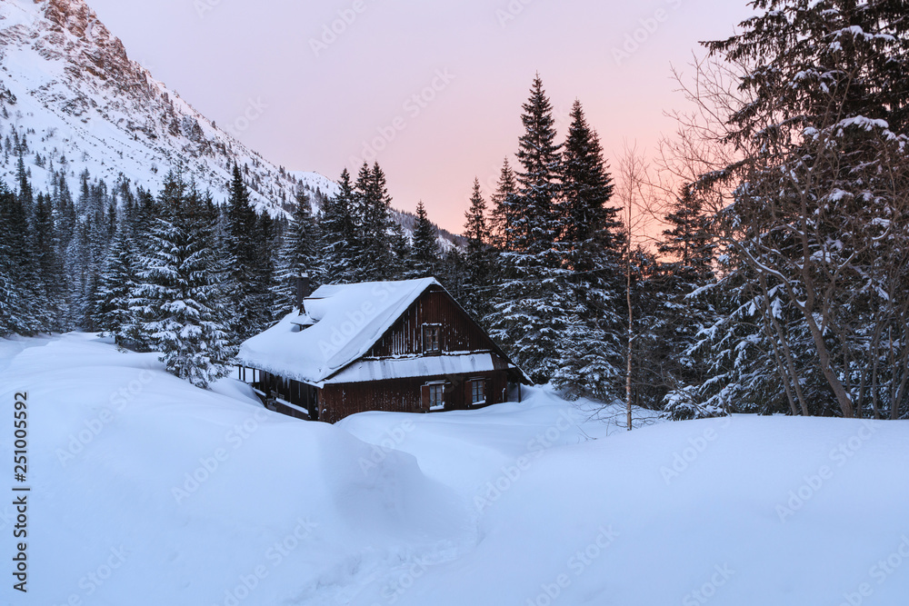 The old wooden house in mountains at dawn The old wooden house in mountains at dawn