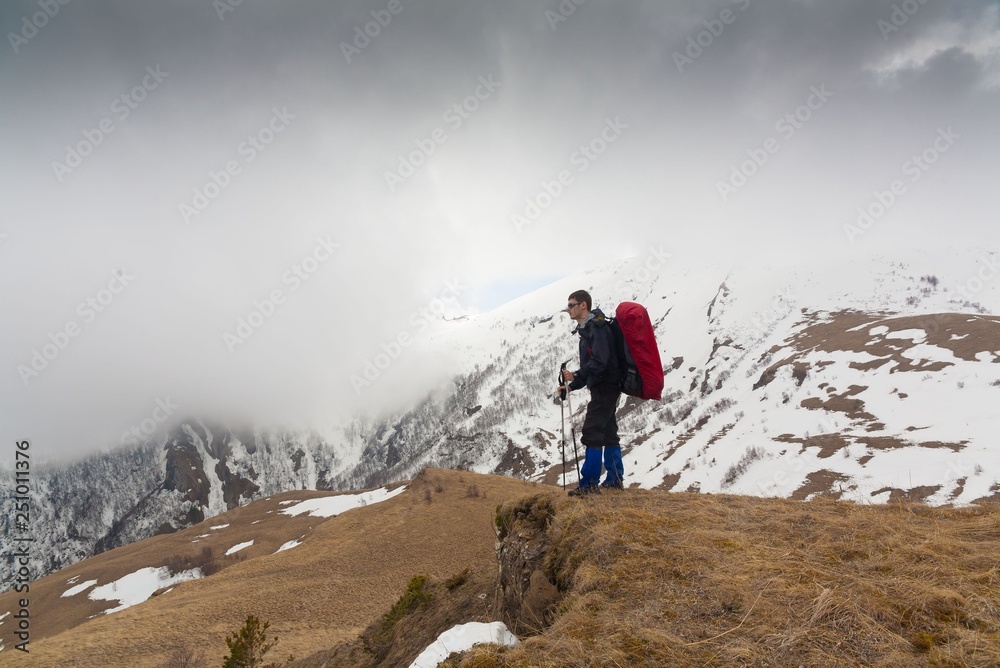 A man in mountain day winter. Unique