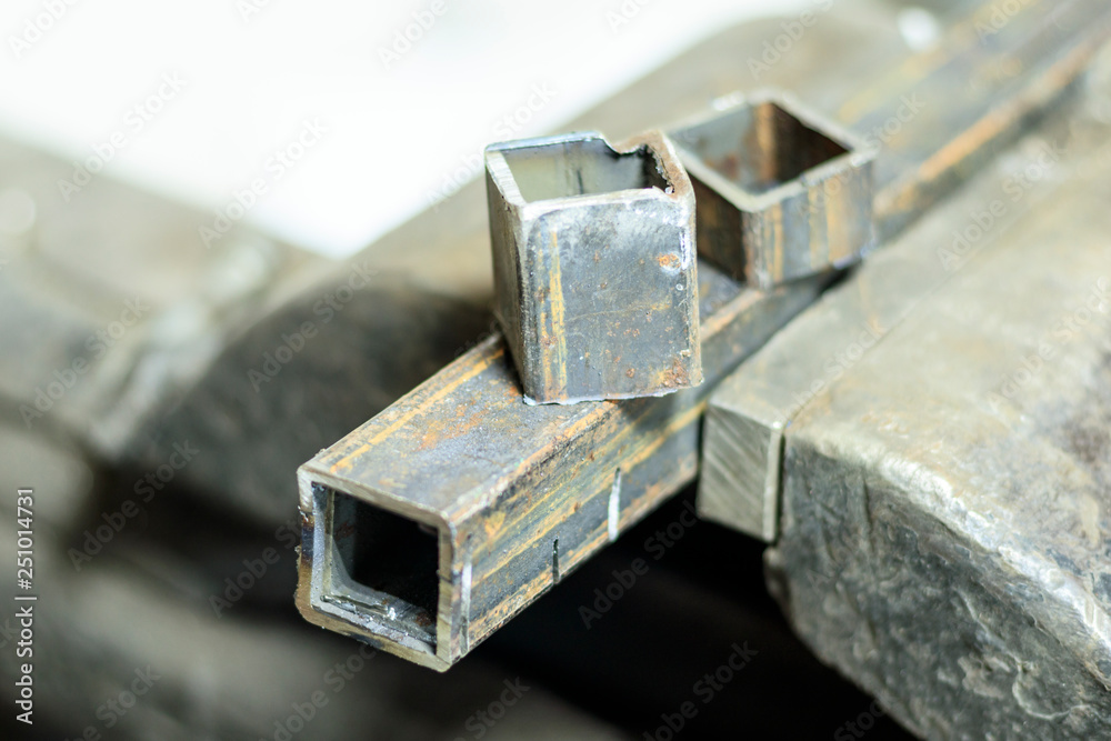 metal clutches in them clamped square tube. there is still a piece on top. shallow depth of cut. metal clutches in them clamped square tube. there is still a piece on top. shallow depth of cut.