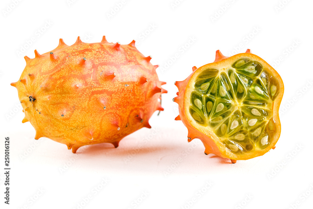 Fototapeta premium Fresh organic kiwano or horned melon on white background.