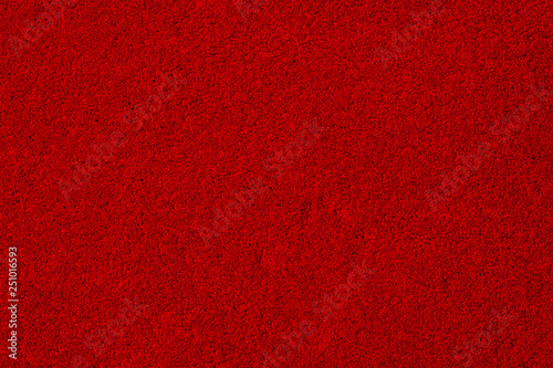 Tableau sur toile Soft bright red carpet as background, top view