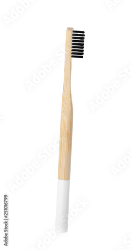Toothbrush made of bamboo on white background