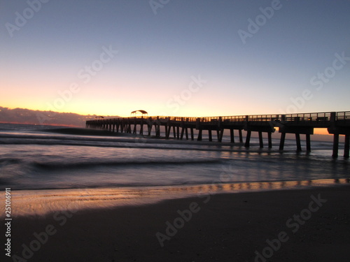 old wooden pier at sunset © Charlene