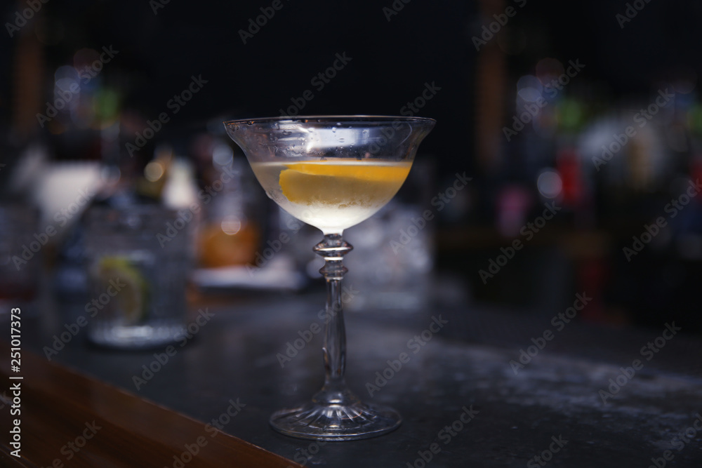 Glass of tasty cocktail on bar counter Glass of tasty cocktail on bar counter