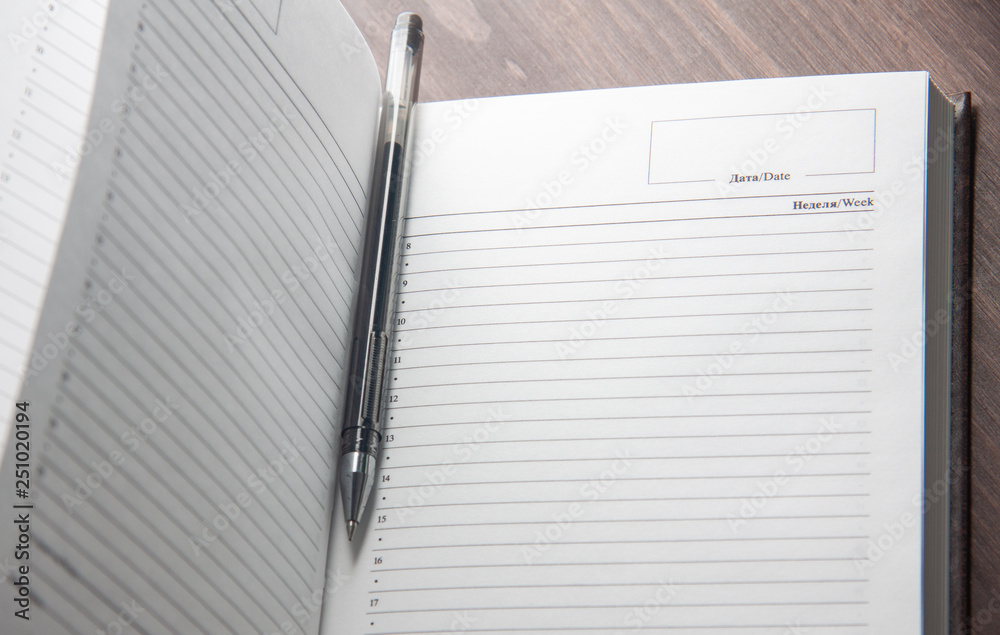 notebook and pen on white background notebook and pen on white background
