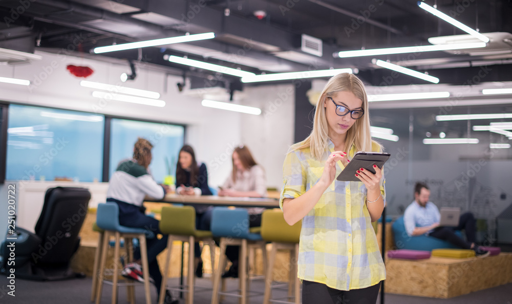blonde businesswoman working online using digital tablet blonde businesswoman working online using digital tablet