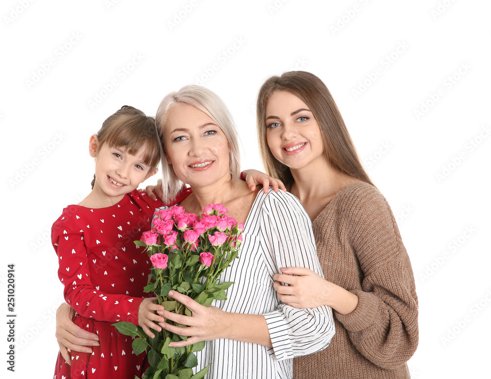 Beautiful mature lady, daughter and grandchild with flowers on white background. Happy Women's Day Beautiful mature lady, daughter and grandchild with flowers on white background. Happy Women's Day