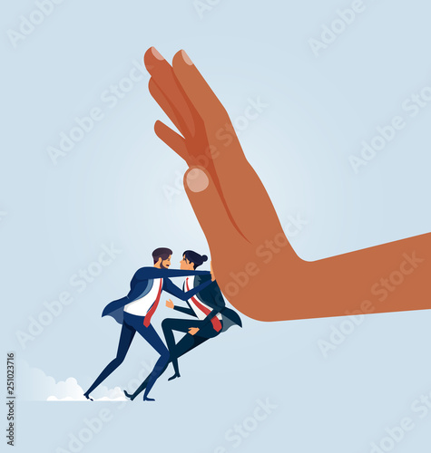 Businessman pushing big hand