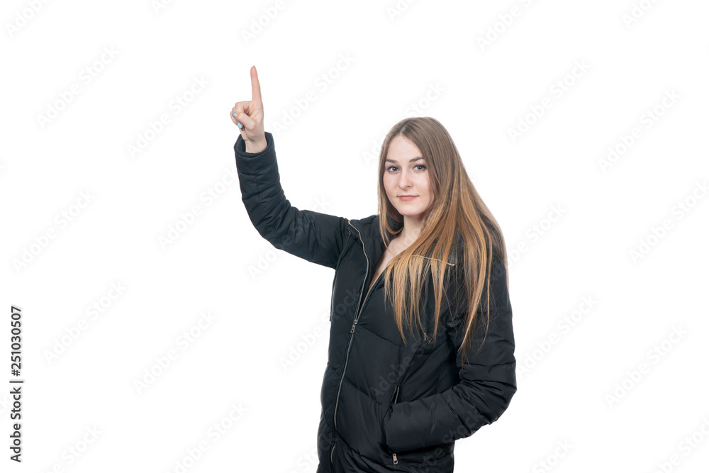woman in jacket points finger up woman in jacket points finger up