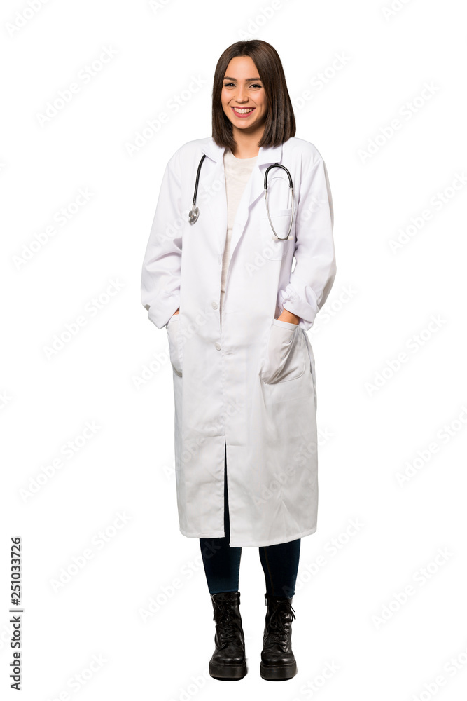 A full-length shot of a Young doctor woman smiling a lot over isolated white background A full-length shot of a Young doctor woman smiling a lot over isolated white background