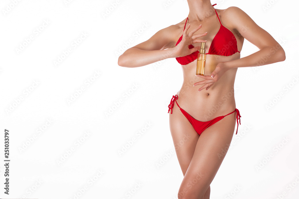 Sex Katar Hot Girl Sex Porn Oil Vidio - Female sexy tanned fit body in red classic bikini with oil spray bottle,  isolated on white Stock Photo | Adobe Stock